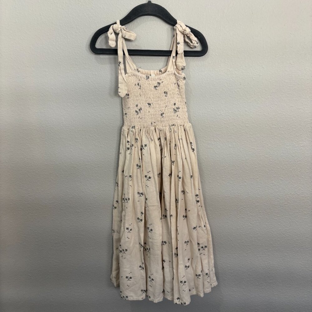 Rylee + Cru cream with dark gray palm trees, shoulder ties, top is smocked